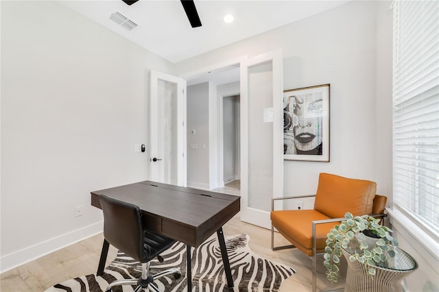 2110 Hillcrest St, Orlando, FL 32803 - office area featuring ceiling fan, light wood finished floors, and baseboards