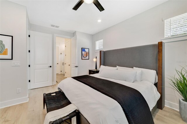 2110 Hillcrest St, Orlando, FL 32803 - bedroom featuring light wood-style floors, baseboards, and ceiling fan