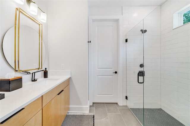 2110 Hillcrest St, Orlando, FL 32803 - full bathroom featuring a stall shower, vanity, baseboards, and tile patterned floors