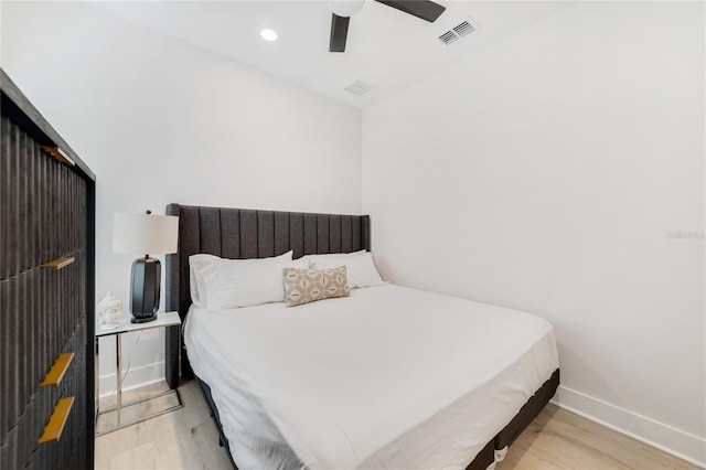 2110 Hillcrest St, Orlando, FL 32803 - bedroom with baseboards, wood finished floors, and ceiling fan