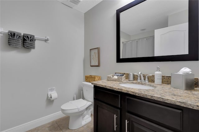 8124 Roseville Rd, Davenport, FL 33896 - full bath featuring tile patterned flooring, baseboards, toilet, and vanity