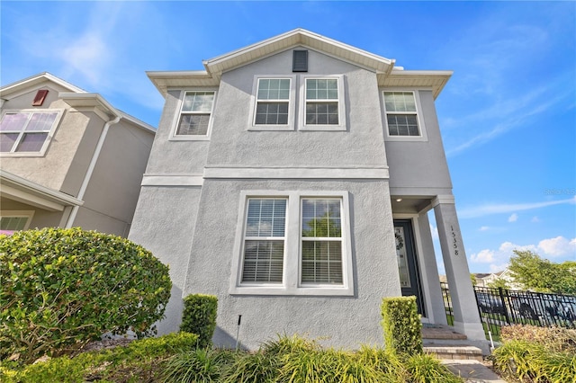 15358 Arcadia Bluff Loop, Winter Garden, FL 34787 - traditional home featuring stucco siding and fence