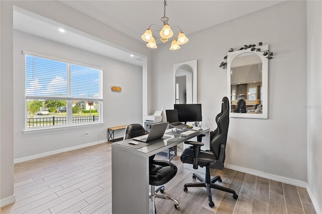 15358 Arcadia Bluff Loop, Winter Garden, FL 34787 - office featuring wood finished floors, baseboards, a chandelier, recessed lighting, and arched walkways