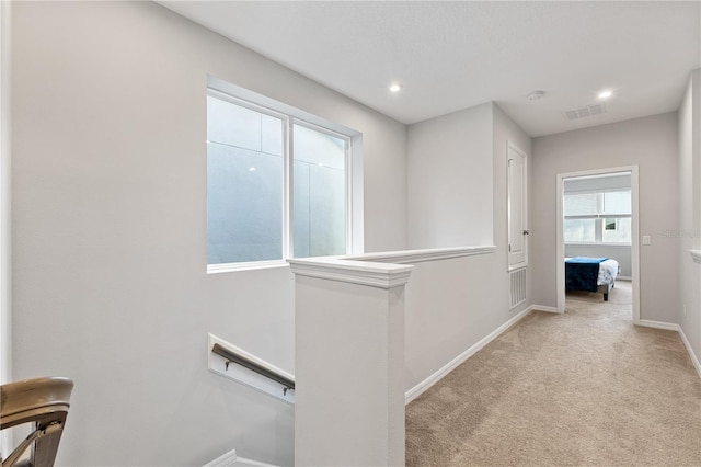 15358 Arcadia Bluff Loop, Winter Garden, FL 34787 - hall featuring an upstairs landing, baseboards, carpet, and recessed lighting