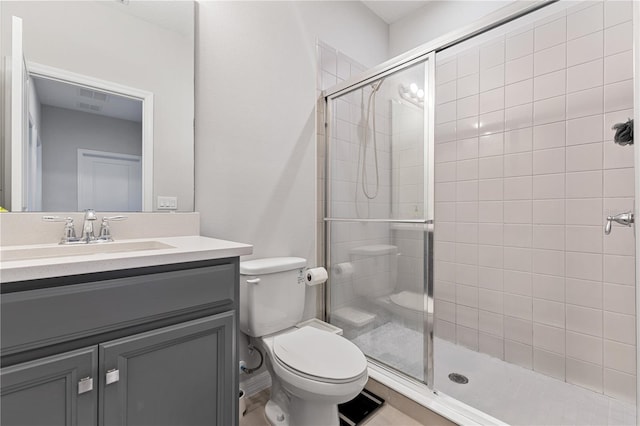 15358 Arcadia Bluff Loop, Winter Garden, FL 34787 - bathroom featuring a stall shower, toilet, and vanity