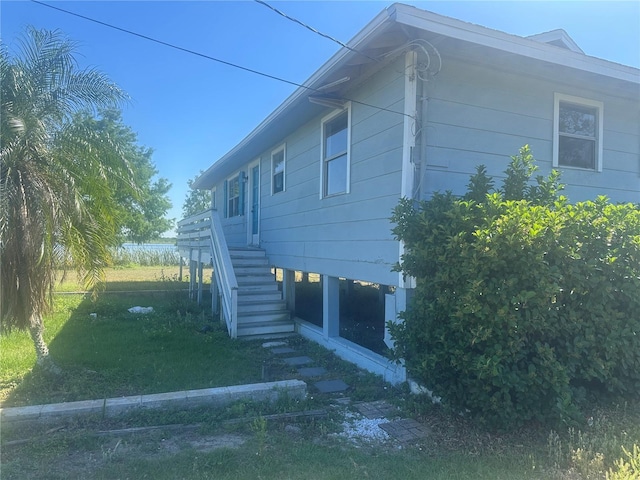 14330 Ellerbee St, Winter Garden, FL 34787 - view of side of property featuring stairway