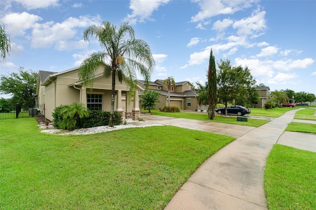 1089 Seburn Rd, Apopka, FL 32703 - view of front of property with stucco siding, driveway, and cooling unit