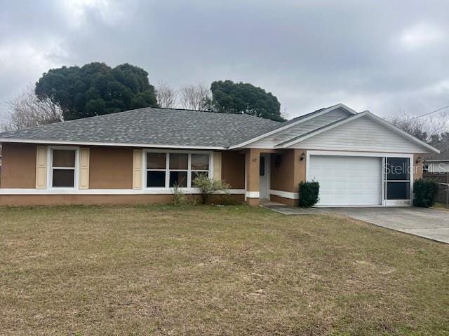 ranch-style house featuring concrete driveway, an attached garage, a front lawn, and a shingled roof