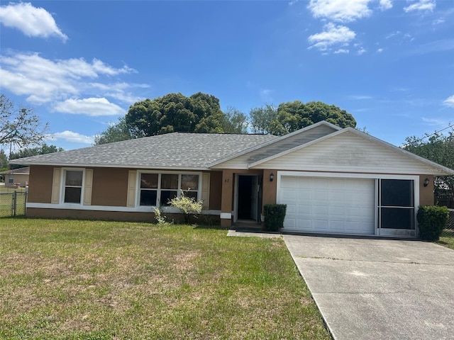 42 Banyan Pass, Ocala, FL 34472 - ranch-style house featuring an attached garage, driveway, and a shingled roof