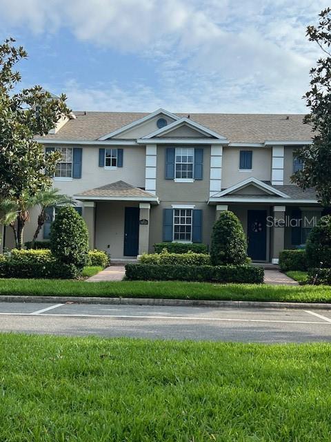 14531 Pleach St, Winter Garden, FL 34787 - multi unit property featuring stucco siding and a front lawn