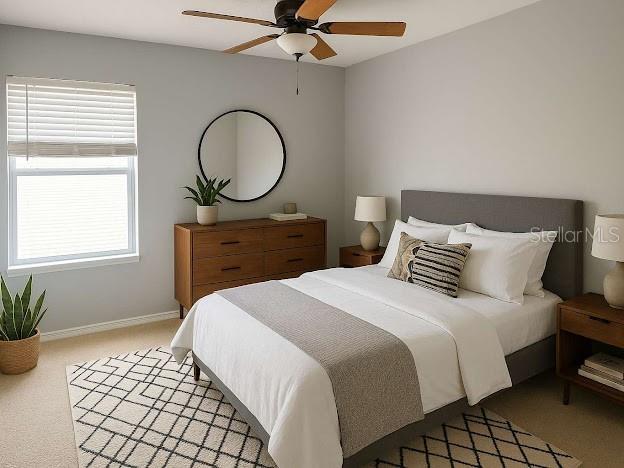 14531 Pleach St, Winter Garden, FL 34787 - bedroom with light colored carpet and ceiling fan