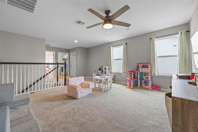 646 Marsh Reed Dr, Winter Garden, FL 34787 - recreation room featuring ceiling fan, carpet floors, baseboards, a textured ceiling, and recessed lighting