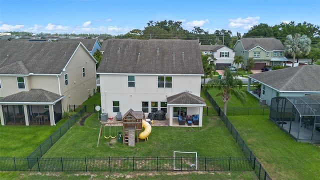 646 Marsh Reed Dr, Winter Garden, FL 34787 - back of property featuring a playground, stucco siding, a residential view, a patio, and central AC