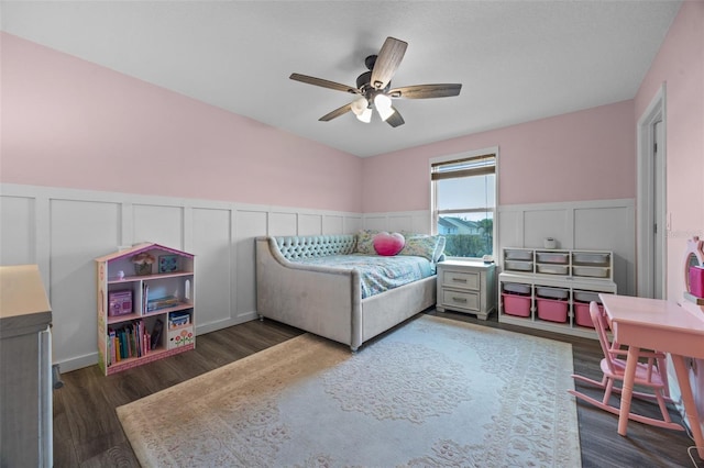 646 Marsh Reed Dr, Winter Garden, FL 34787 - bedroom with a decorative wall, a wainscoted wall, wood finished floors, and ceiling fan