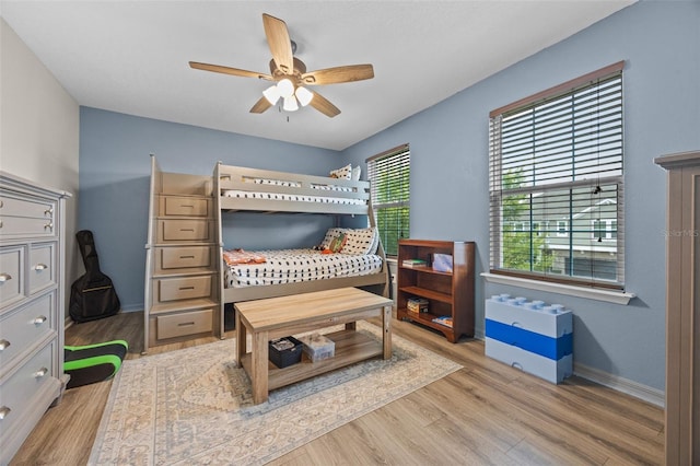 646 Marsh Reed Dr, Winter Garden, FL 34787 - bedroom with wood finished floors and ceiling fan