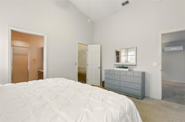 1548 Challenger Ave, Davenport, FL 33897 - bedroom with high vaulted ceiling, a wall mounted air conditioner, carpet, ensuite bath, and a walk in closet
