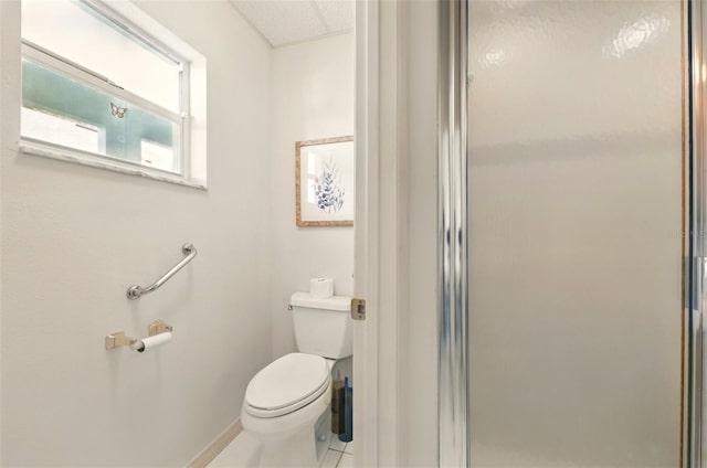 1548 Challenger Ave, Davenport, FL 33897 - full bathroom featuring toilet, a shower stall, and tile patterned floors