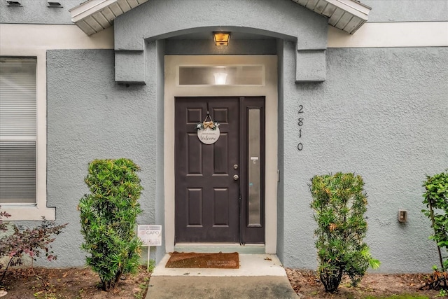 2810 San Jacinto Cir Unit 2810, Sanford, FL 32771 - property entrance with stucco siding