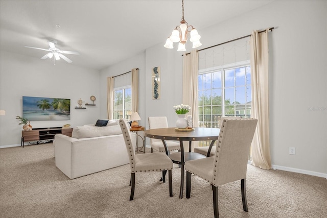 2810 San Jacinto Cir Unit 2810, Sanford, FL 32771 - carpeted dining area with a chandelier, baseboards, and ceiling fan