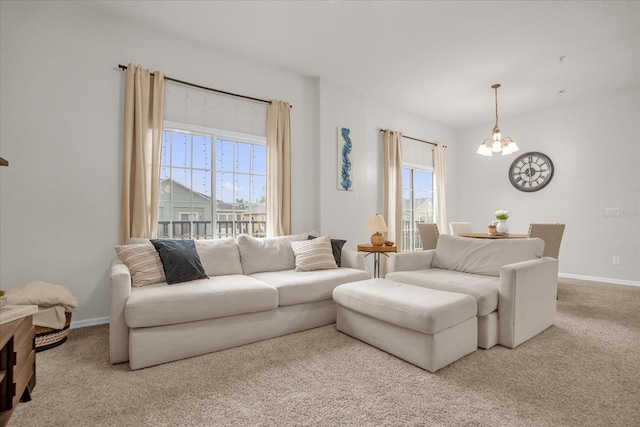 2810 San Jacinto Cir Unit 2810, Sanford, FL 32771 - carpeted living area with a chandelier and baseboards
