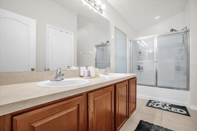 2810 San Jacinto Cir Unit 2810, Sanford, FL 32771 - full bath featuring tile patterned flooring, double vanity, bath / shower combo with glass door, and vaulted ceiling