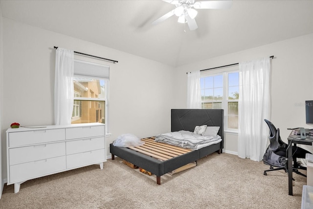 2810 San Jacinto Cir Unit 2810, Sanford, FL 32771 - carpeted bedroom featuring multiple windows, an office area, a ceiling fan, and vaulted ceiling