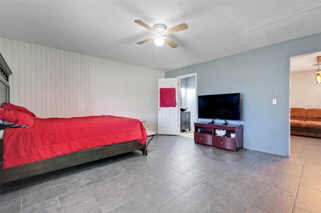 106 8th St, Lake Hamilton, FL 33851 - bedroom featuring a ceiling fan and a textured ceiling
