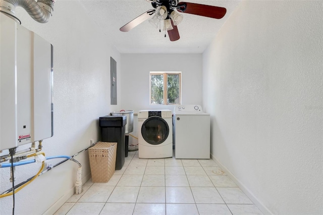 106 8th St, Lake Hamilton, FL 33851 - washroom with washing machine and dryer, baseboards, electric panel, water heater, and a textured ceiling