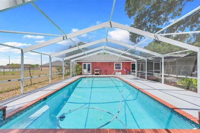 106 8th St, Lake Hamilton, FL 33851 - outdoor pool featuring fence, a patio area, and glass enclosure