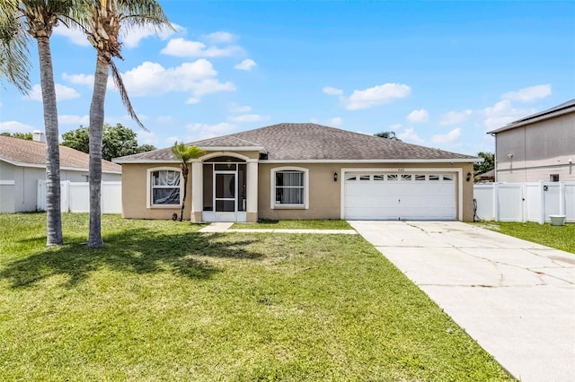 460 Flamingo Ct, Kissimmee, FL 34759 - ranch-style home featuring stucco siding, an attached garage, driveway, and a shingled roof