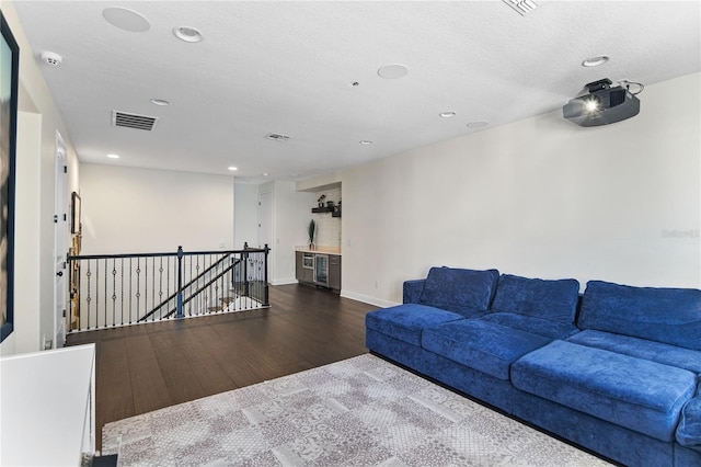 557 Lake Cove Pointe Cir, Winter Garden, FL 34787 - living area with wood finished floors, recessed lighting, and baseboards