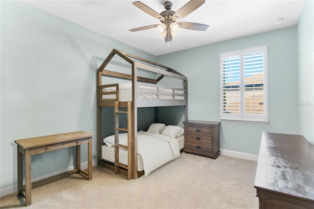 557 Lake Cove Pointe Cir, Winter Garden, FL 34787 - bedroom with carpet flooring, baseboards, and ceiling fan