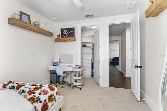 557 Lake Cove Pointe Cir, Winter Garden, FL 34787 - carpeted bedroom featuring baseboards and a ceiling fan