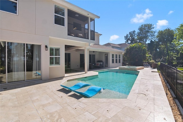 557 Lake Cove Pointe Cir, Winter Garden, FL 34787 - view of swimming pool featuring a patio, a ceiling fan, and a pool with connected hot tub