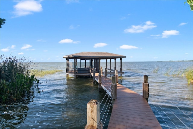 557 Lake Cove Pointe Cir, Winter Garden, FL 34787 - dock area featuring a water view and boat lift