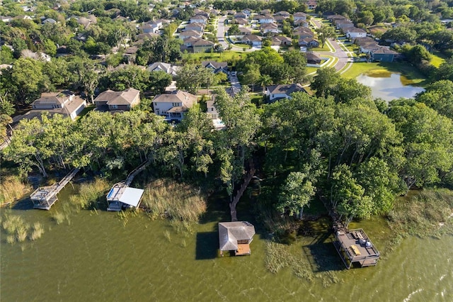 557 Lake Cove Pointe Cir, Winter Garden, FL 34787 - aerial overview of property's location with nearby suburban area, a large body of water, and a tree filled landscape