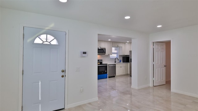 326 Hobart Ave, Daytona Beach, FL 32114 - foyer entrance with recessed lighting and baseboards