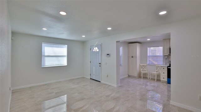 326 Hobart Ave, Daytona Beach, FL 32114 - foyer entrance featuring healthy amount of natural light, recessed lighting, and baseboards