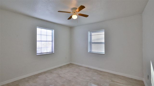326 Hobart Ave, Daytona Beach, FL 32114 - empty room with a ceiling fan and baseboards