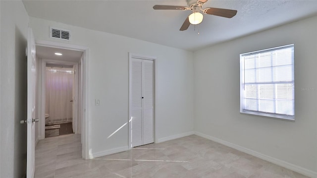 326 Hobart Ave, Daytona Beach, FL 32114 - unfurnished bedroom with a closet, baseboards, and ceiling fan