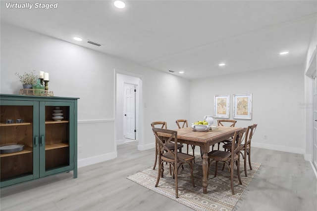 3100 Las Palmas Dr, Titusville, FL 32780 - dining space with light wood finished floors, recessed lighting, and baseboards