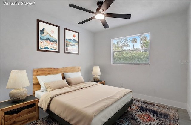 3100 Las Palmas Dr, Titusville, FL 32780 - bedroom with baseboards and ceiling fan