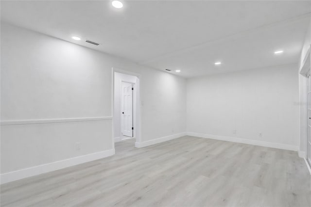 3100 Las Palmas Dr, Titusville, FL 32780 - below grade area featuring recessed lighting, light wood-style floors, and baseboards