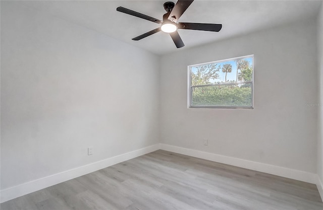 3100 Las Palmas Dr, Titusville, FL 32780 - spare room with baseboards, light wood-type flooring, and ceiling fan