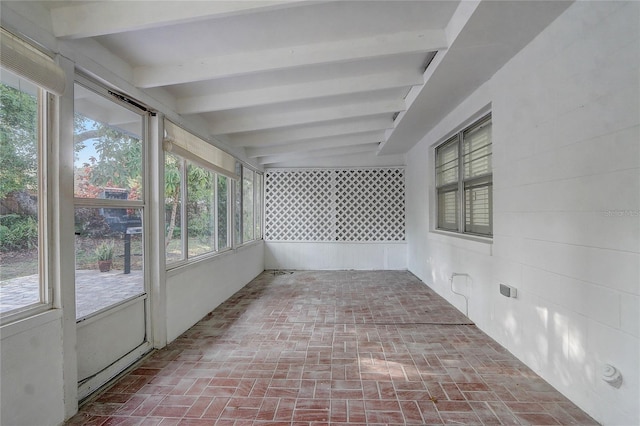 3100 Las Palmas Dr, Titusville, FL 32780 - unfurnished sunroom with brick floors and beamed ceiling