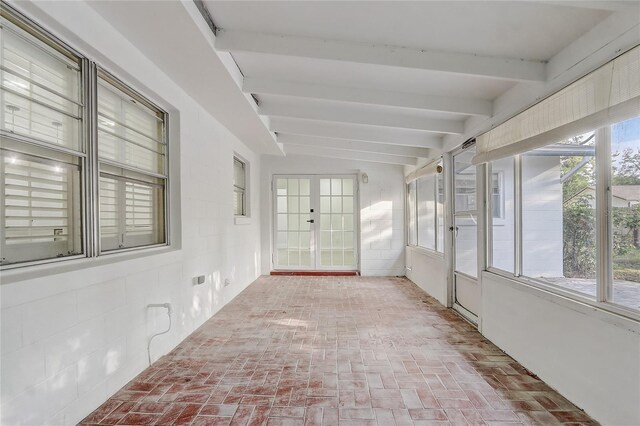 3100 Las Palmas Dr, Titusville, FL 32780 - unfurnished sunroom featuring beam ceiling