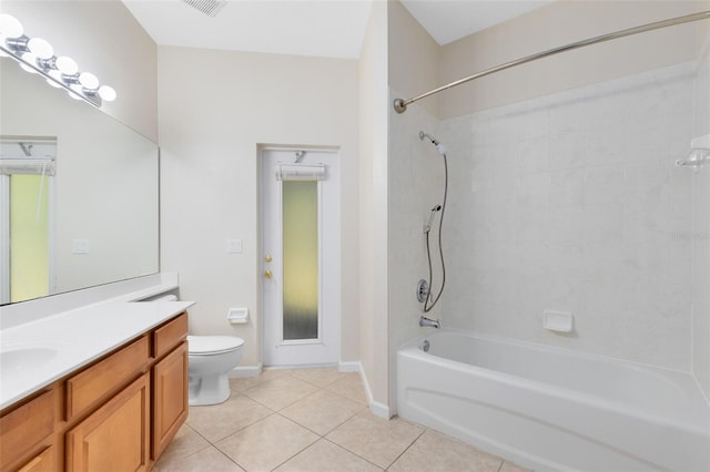9330 Shadow Pinar Ct, Orlando, FL 32825 - bathroom with tile patterned floors, toilet, vanity, shower / bath combination, and baseboards