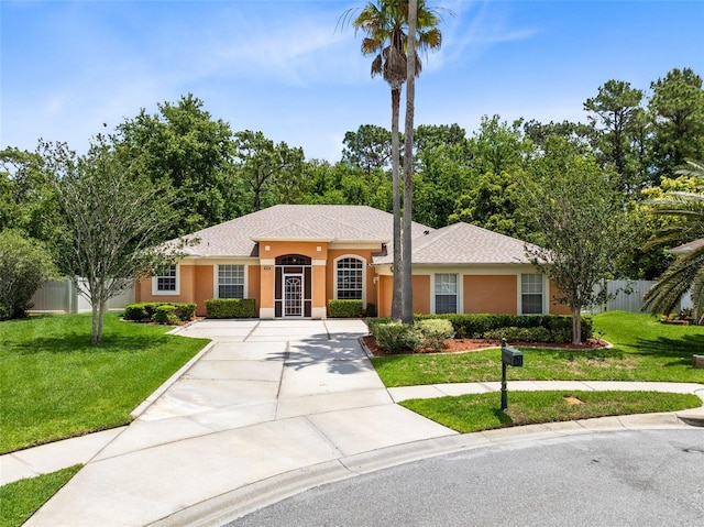 9330 Shadow Pinar Ct, Orlando, FL 32825 - single story home with concrete driveway and stucco siding