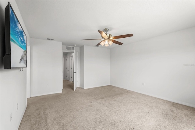 3039 Meleto Blvd, New Smyrna Beach, FL 32168 - unfurnished room featuring light colored carpet and ceiling fan
