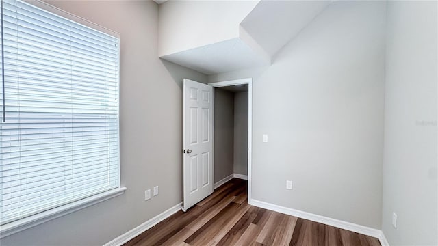 9917 Summerlake Groves St, Winter Garden, FL 34787 - unfurnished bedroom with dark wood finished floors and baseboards